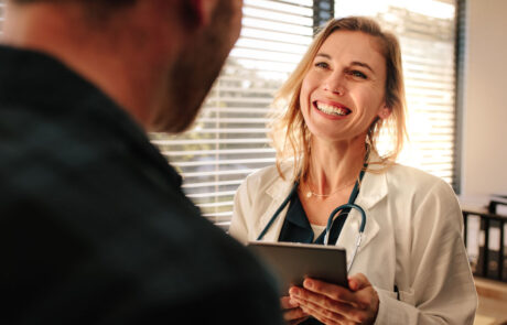Friendly doctor interacting with her patient
