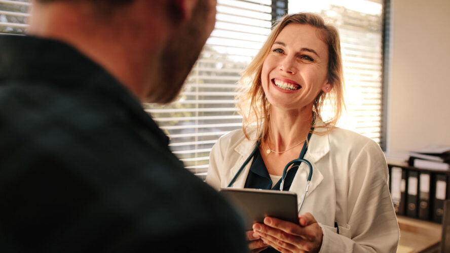 Friendly doctor interacting with her patient