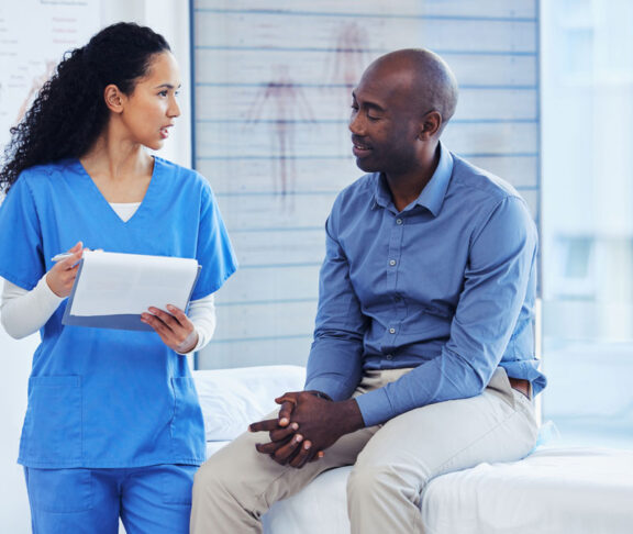 Patient, nurse and healthcare clipboard in hospital for health insurance consultation. Patient and professional nurse woman talking about symptoms, wellness and questions or advice for healthy life