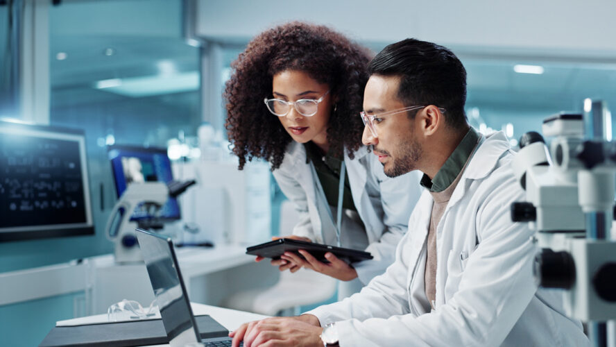 Science, teamwork and scientist with tablet in laboratory for communication, pharmaceutical review or planning. Employees, collaboration and technology for research, discussion and digital analysis