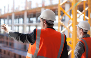 Construction workers working on construction site