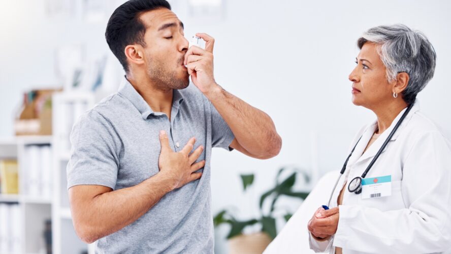 Asthma inhaler, patient and doctor with healthcare and medicine for lung disease, wellness and senior woman with man at clinic. Help, trust and care with pump for breathing, with health and drugs