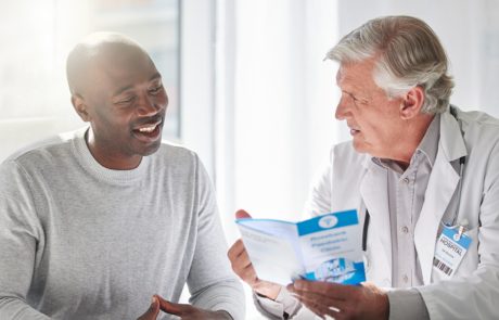 Shot of a mature doctor having a checkup with a patient at a hospital