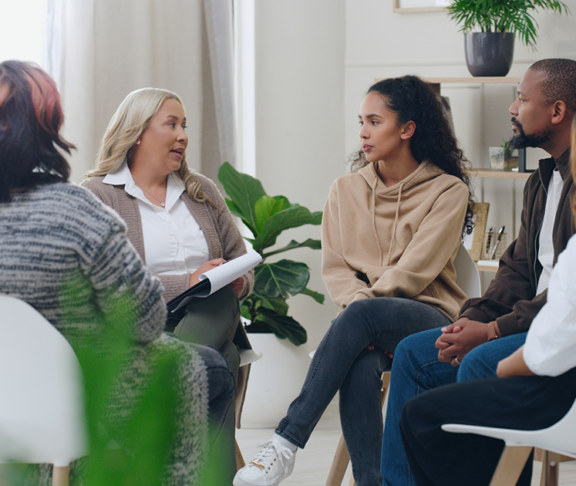 Diversity, mental health and group therapy counseling support meeting, healthy conversation and wellness.